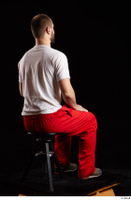  Orest  1 dressed grey shoes jogging suit red panties sitting white t shirt whole body 0004.jpg